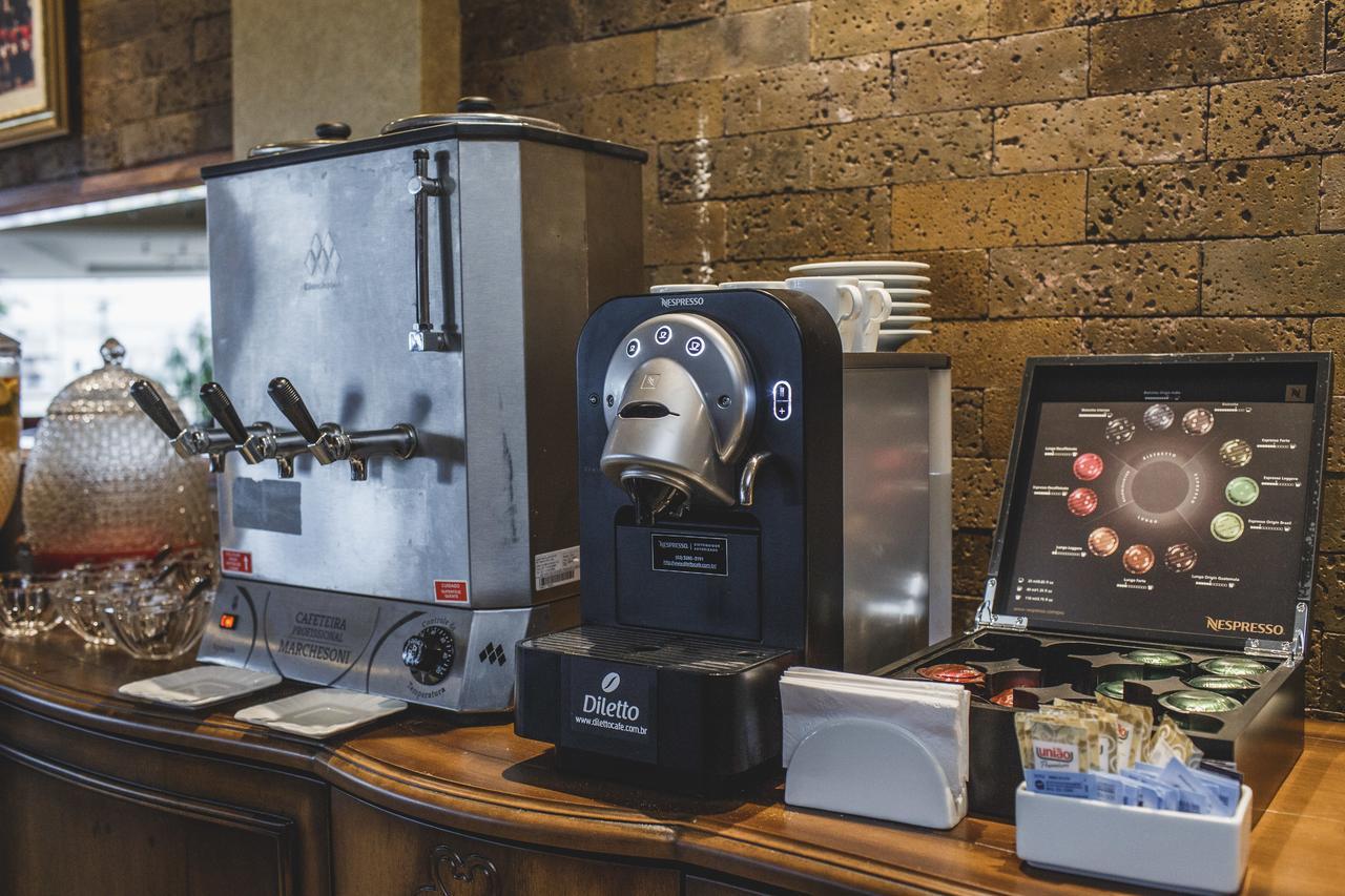 Golden Lis Hotel Boutique Goiânia Exterior foto A single serve coffee machine